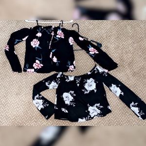 Two crop top long sleeve Kendall and Kylie shirts.